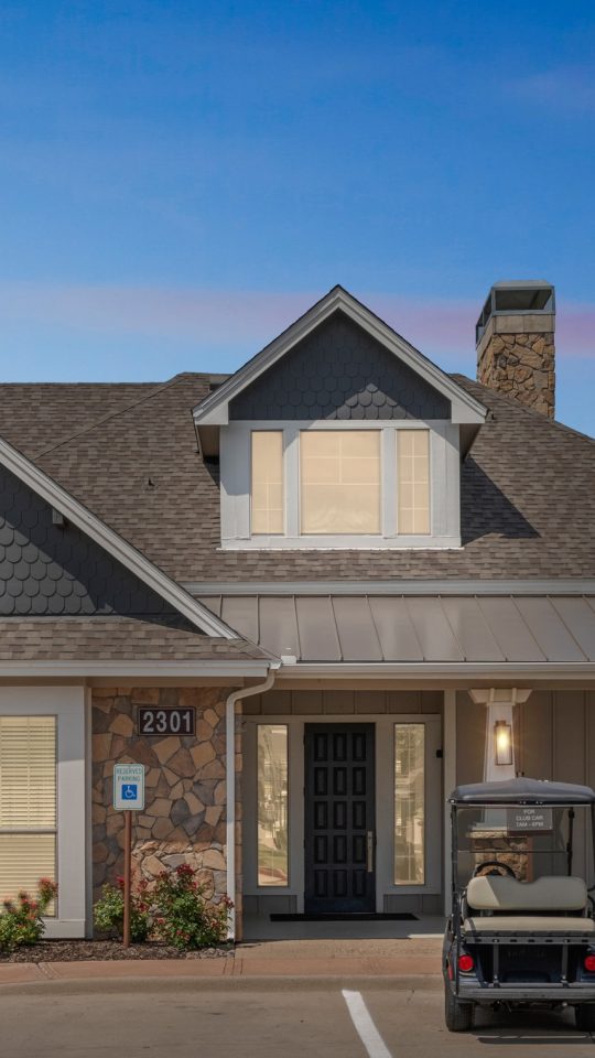 the front of a home with a parking lot and a car at The  Wyatt at Presidio Junction