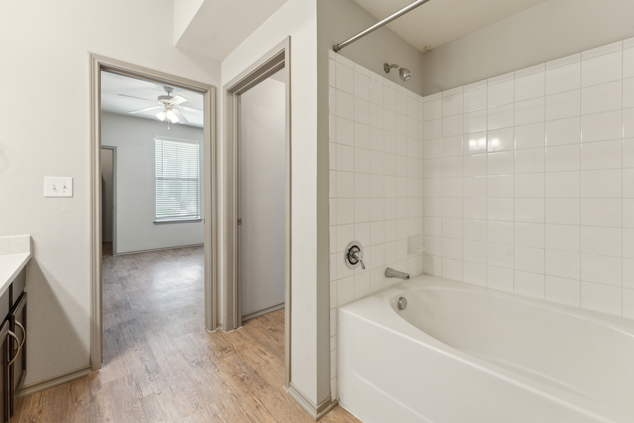 a bathroom with a tub and a shower stall at The  Wyatt at Presidio Junction