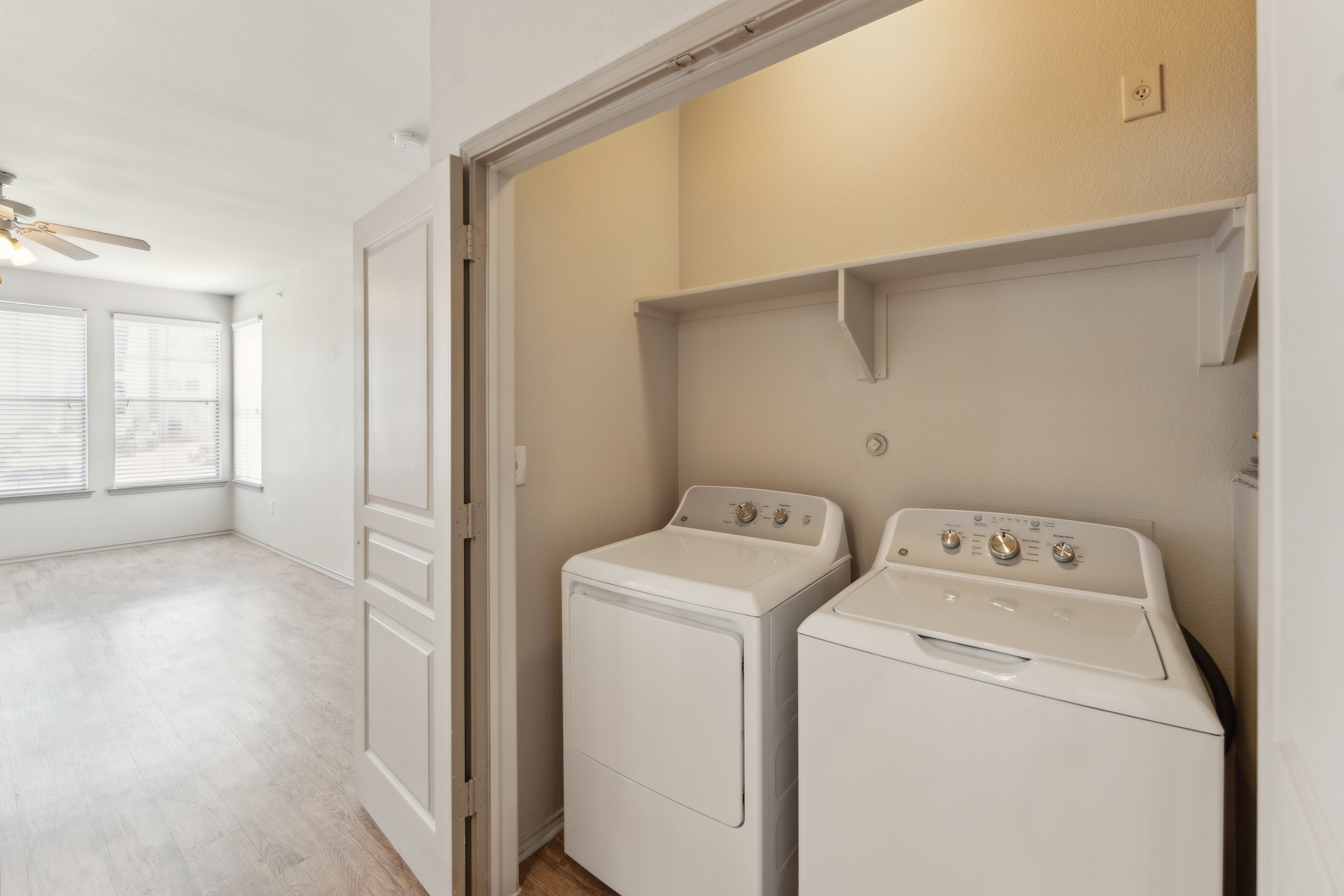 a laundry room with a washer and dryer in it at The  Wyatt at Presidio Junction