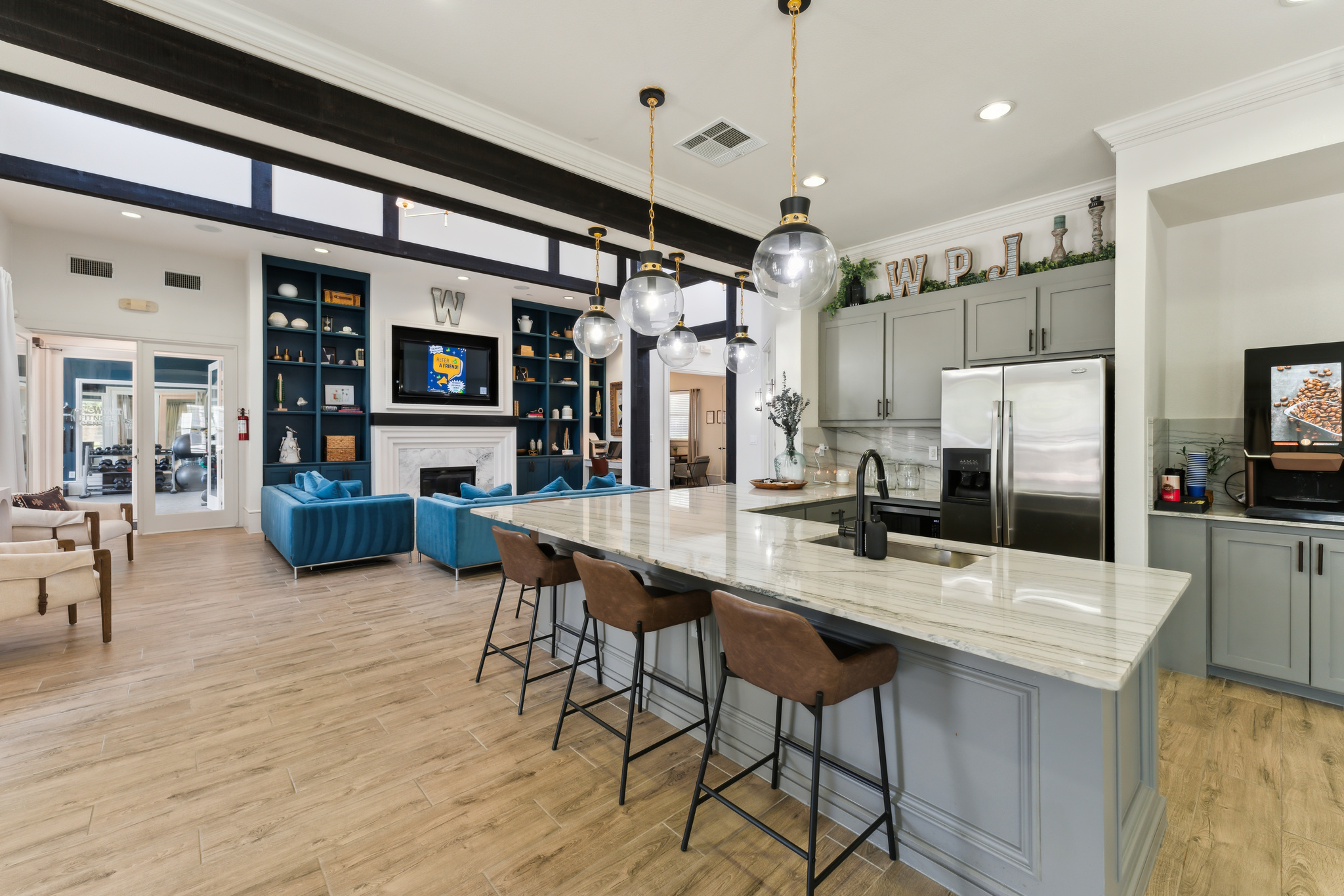 a kitchen with a large island and a large dining area at The  Wyatt at Presidio Junction